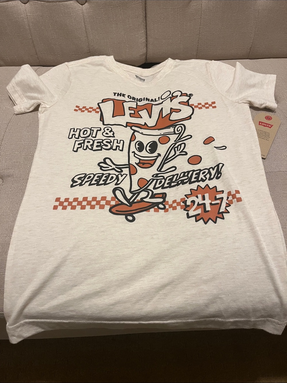 Levi's Off White Tee with Orange & Black Pizza Skate Graphic